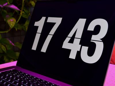 Minimalist digital clock showing training time in purple light.